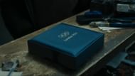 The iconic London 2012 Olympic medal box representing Claressa Shields' historic gold medal victory, a pivotal element in The Fire Inside (2024) (via AppleTv)